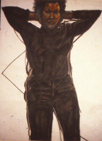 A large full body portrait of a Black woman. She is wearing loose-fitting black trousers and a black jumper and stands with her legs slightly apart and her hands behind her head in a casual and relaxed, yet powerful and unapologetic stance. She stares directly out of the painting with confidence.